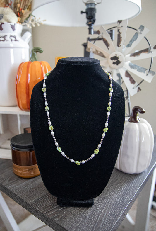 25.5-27 Inch Palomino, Freshwater, Corrugated Saucer, & Sterling Pearl Necklace